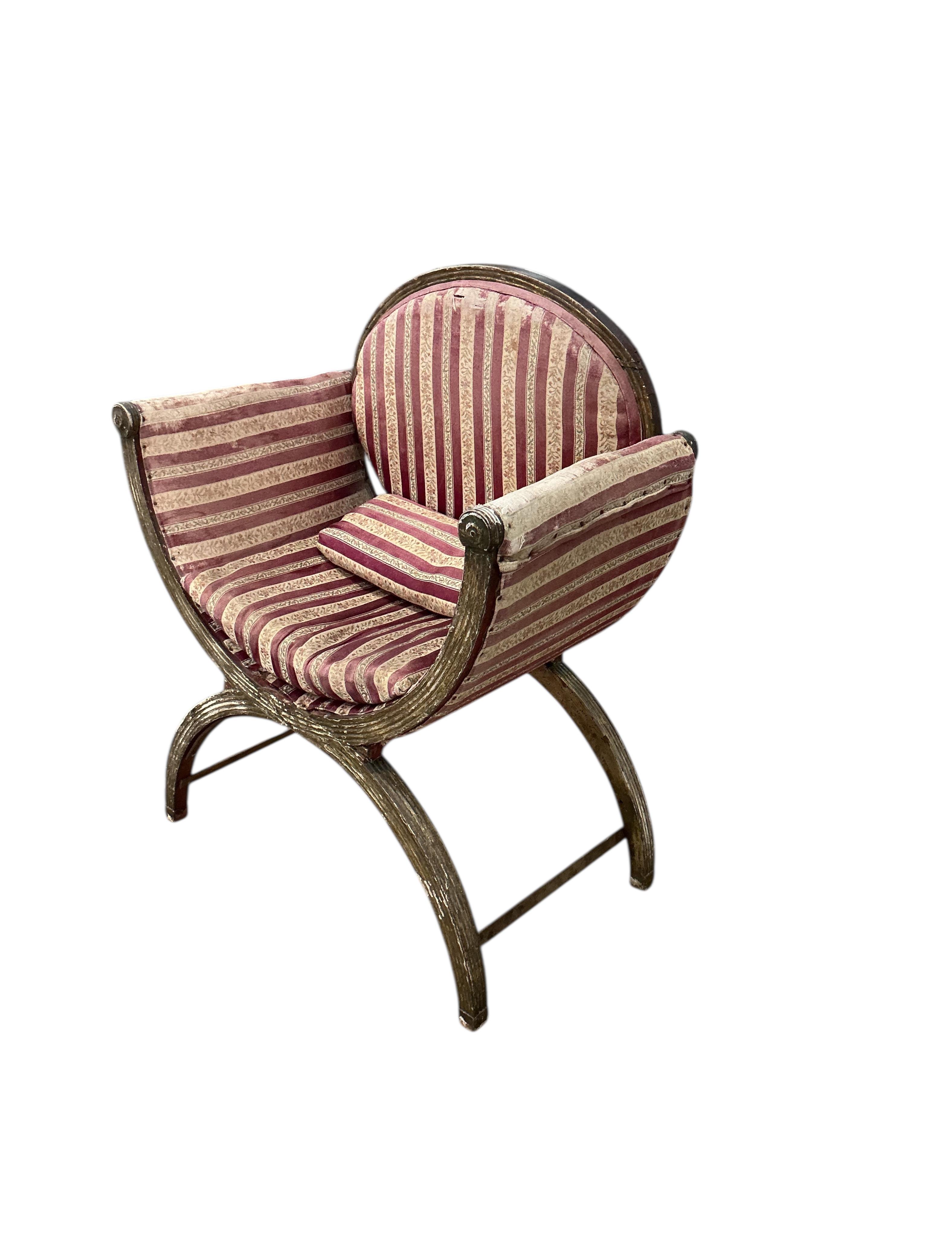 A Regency gilt 'X' framed chair, width 68cm, depth 42cm, height 84cm
